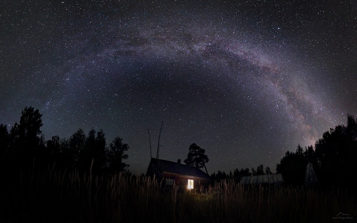 Milky Way over a remote house at night