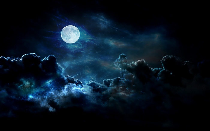 Full moon in a cloudy night sky