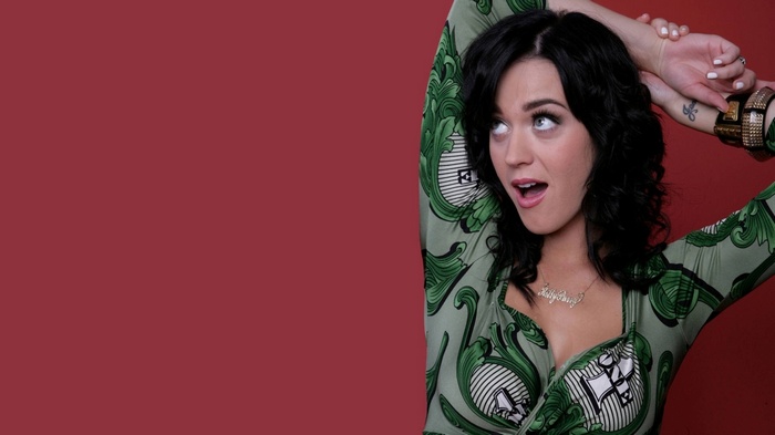 Katy Perry with arms raised