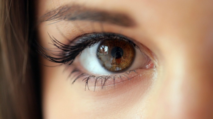 Close-up of Markéta Stroblová's brown eye with reflection