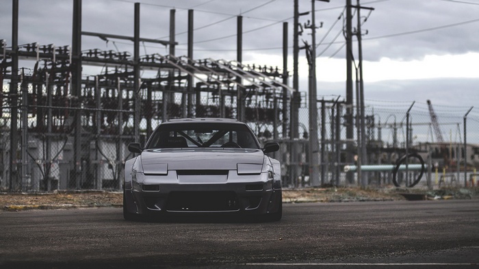 Nissan 240SX in front of electrical substation