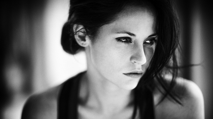 Monochrome portrait of a woman with dark hair