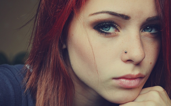 Lana Branishti with red hair and blue eyes