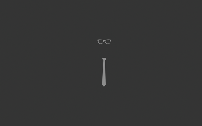 Minimalist tie and glasses on dark background