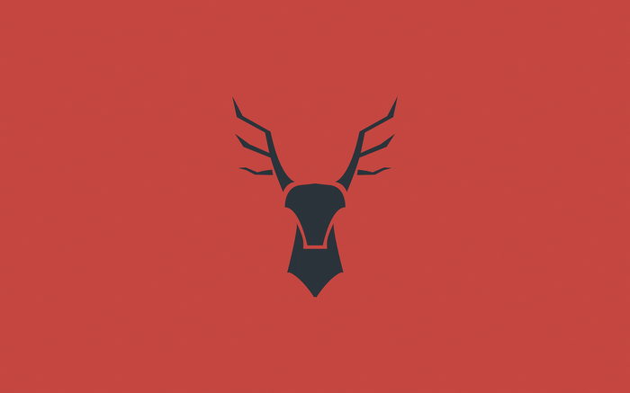 Stylized deer head with antlers on red background