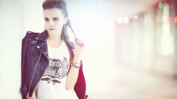 Emma Watson wearing a leather jacket and t-shirt