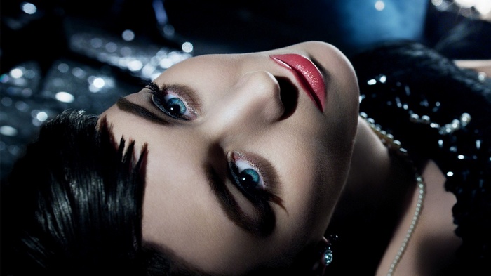 Rooney Mara with red lipstick and blue eyes
