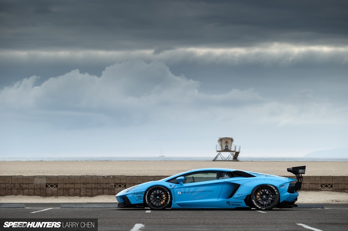 Blue Lamborghini Aventador LB Works by the beach