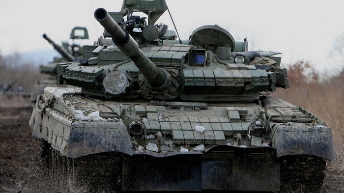 T-80 tank in a muddy field