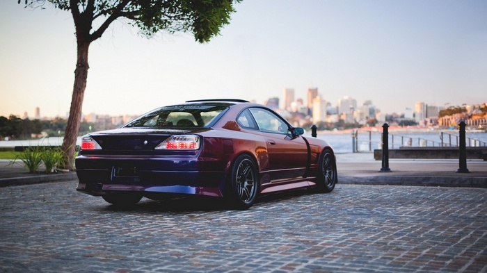 Nissan Silvia S15 parked by a cityscape