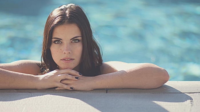 Jaime Alexander in a swimming pool