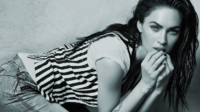 Megan Fox in a black and white portrait