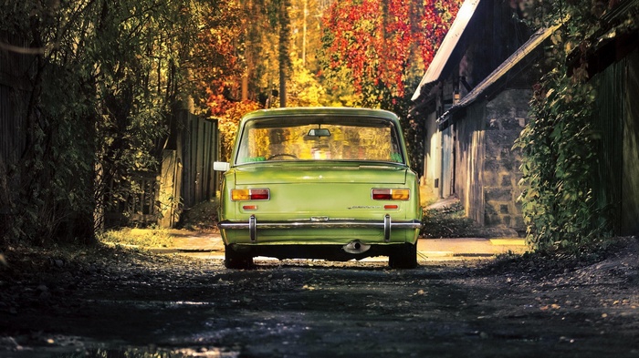 Rear view of a green Lada 2101 car in autumn
