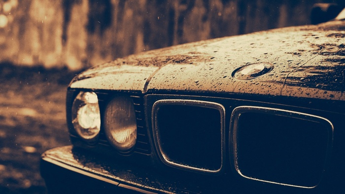 BMW E34 car with water droplets