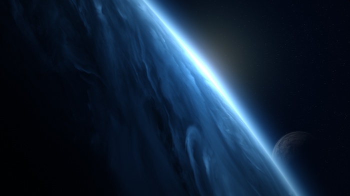Blue planet with a moon in space