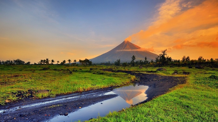 Volcano with smoke and stream in the Philippines