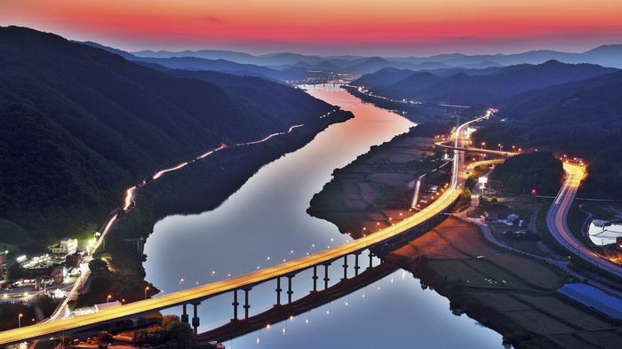 Aerial view of a river and bridge in South Korea at sunset