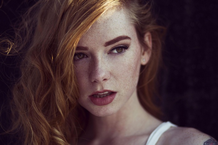 Hattie Watson with red hair and freckles