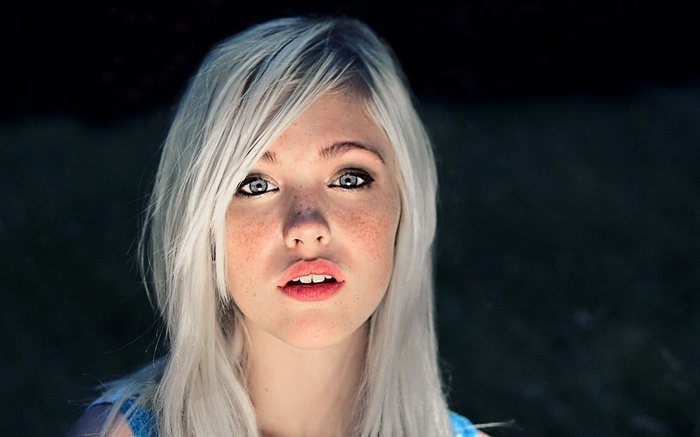 Devon Jade with platinum blonde hair and freckles