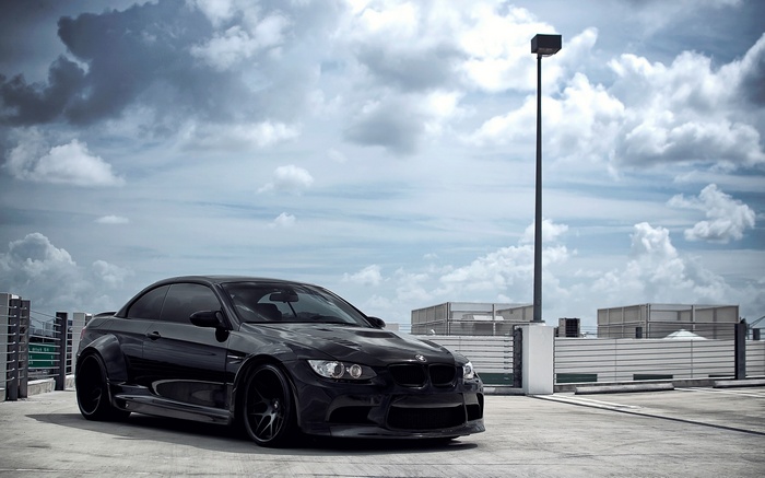 Black BMW M3 Coupe on a Rooftop Parking Lot