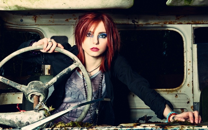 Bella Taylor in a rusty vehicle