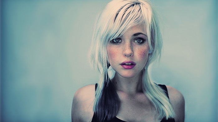 Devon Jade with blonde hair and freckles