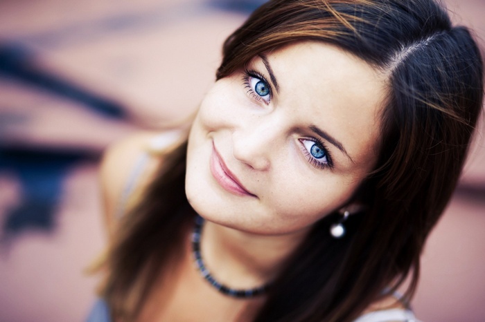 Woman with blue eyes smiling