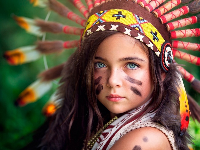 Girl in Native American Headdress with Face Paint