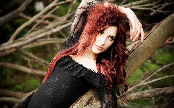 Susan Coffey in a black dress outdoors