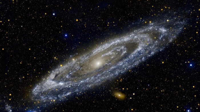 Messier 31 galaxy in deep space with stars