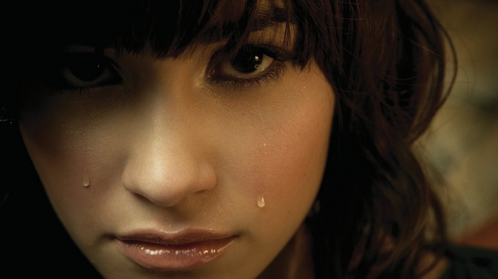 Demi Lovato crying close up