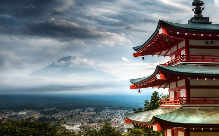 Pagoda overlooking Mount Fuji and a town