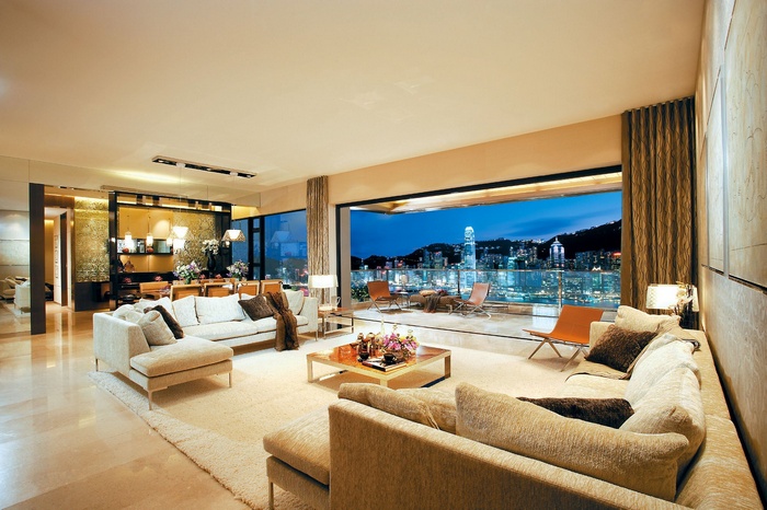 Luxury living room with city view at night