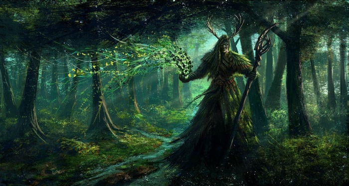 Fantasy druid with antlers in a dark forest