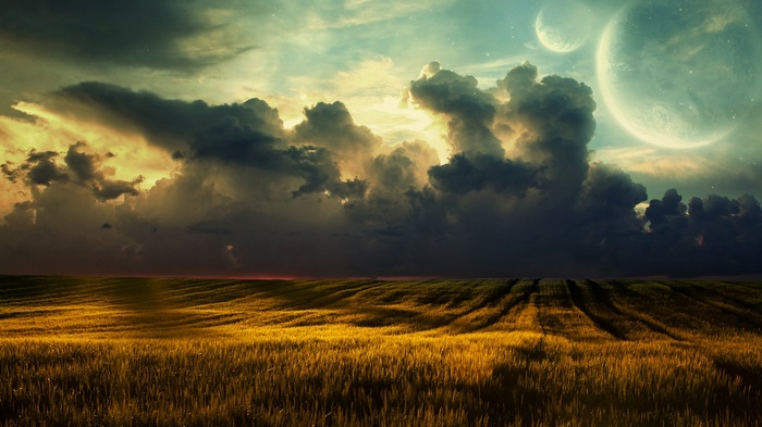 Landscape with dramatic clouds and two moons