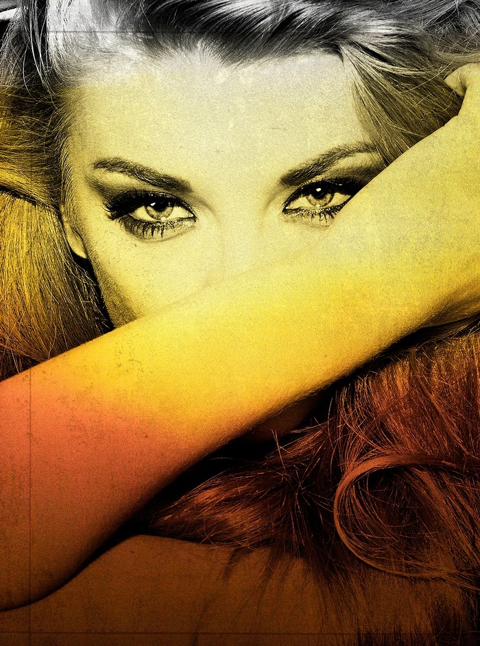 Natalie Dormer with arm across face