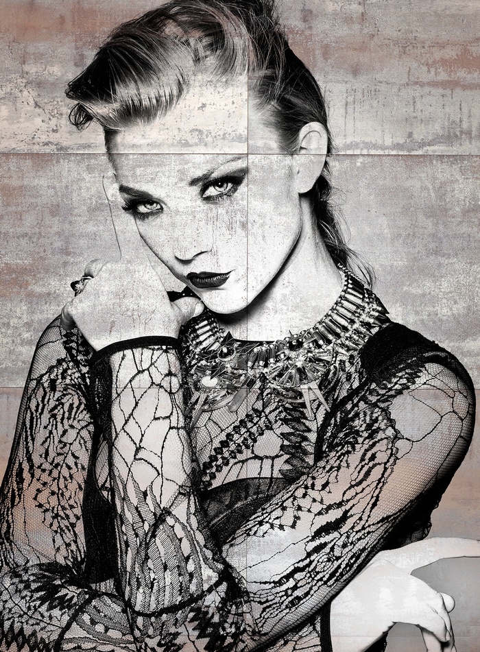 Natalie Dormer in a black lace dress and statement necklace