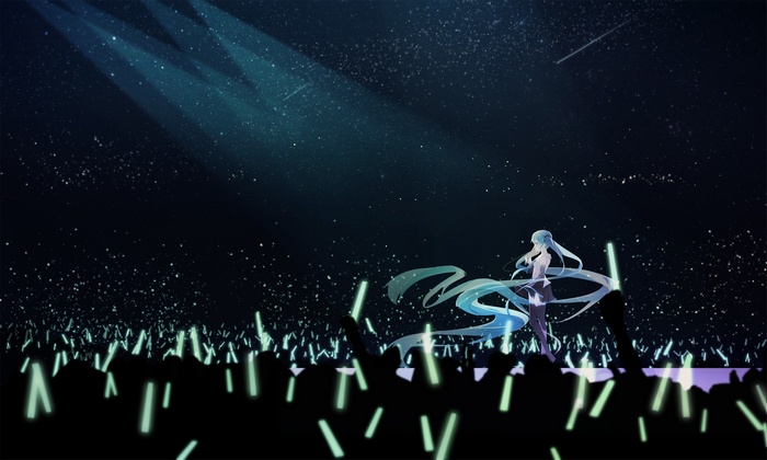 Hatsune Miku performs for a crowd holding glow sticks