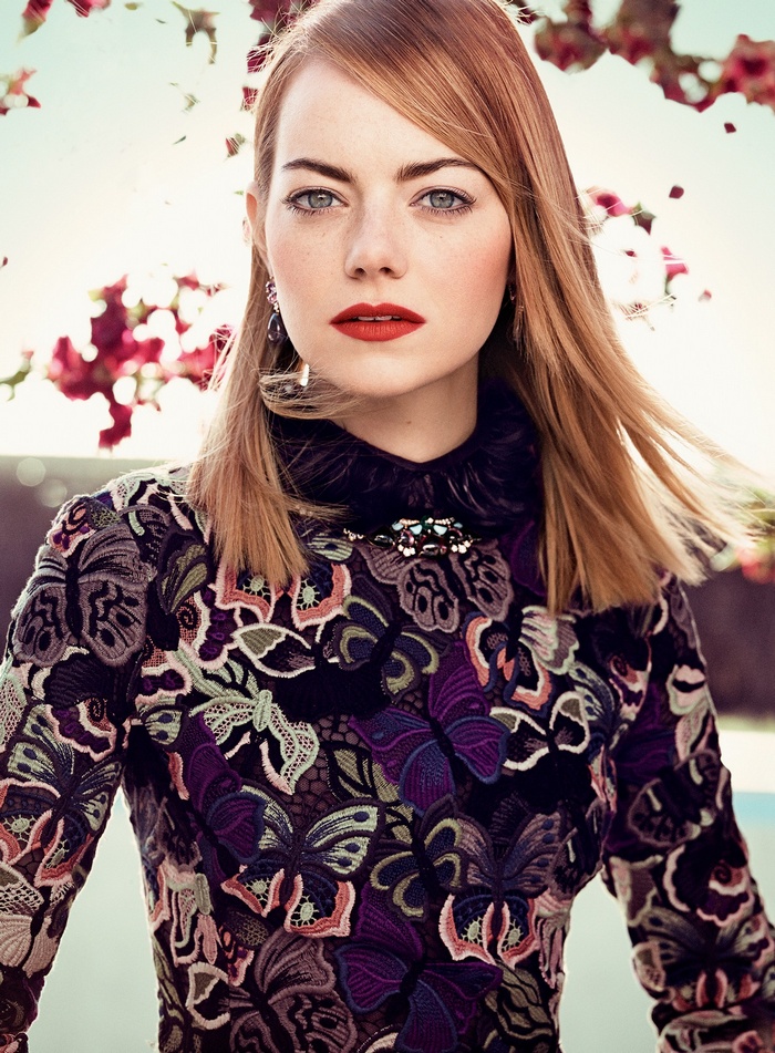 Emma Stone wearing a butterfly-patterned dress