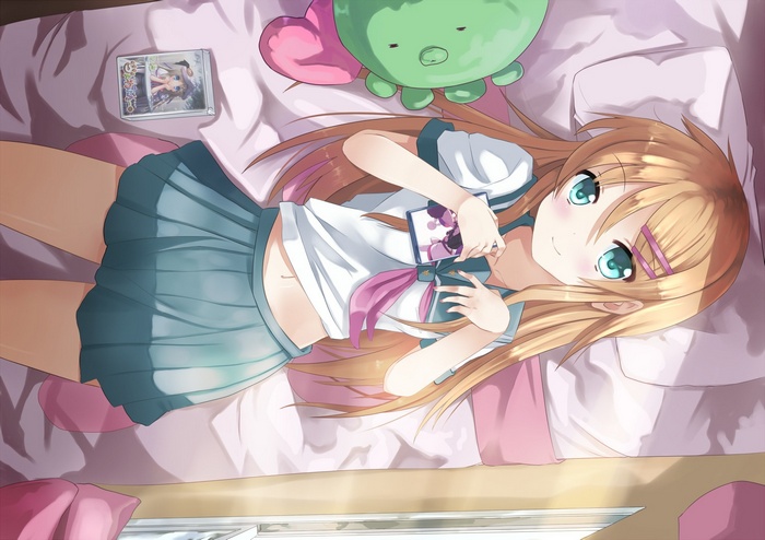 Kousaka Kirino lying on bed with a game and plush toy