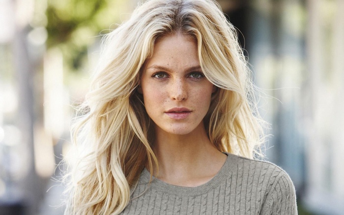 Erin Heatherton wearing a grey sweater