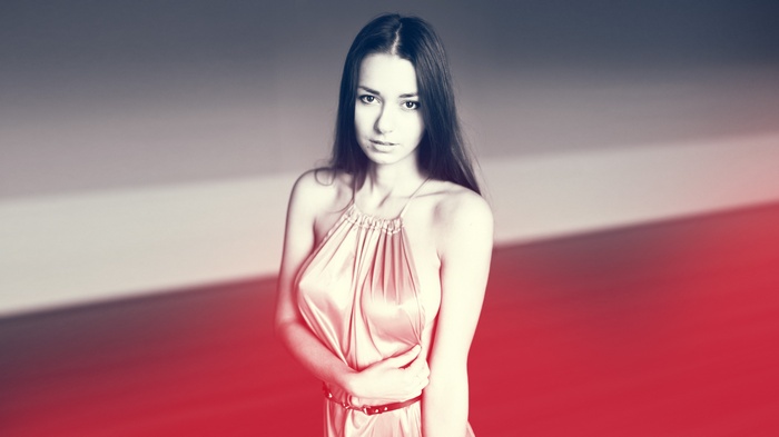 Helga Lovekaty in a satin dress