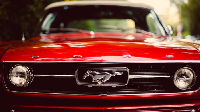 Red Ford Mustang with Horse Emblem