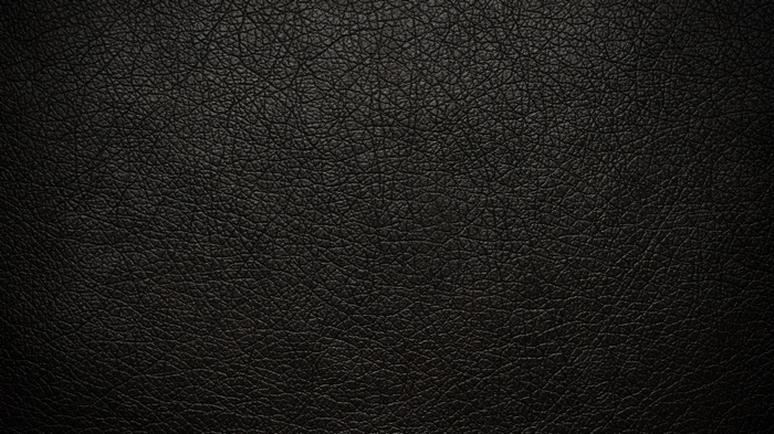 Black leather texture with a subtle gradient