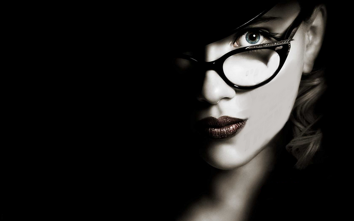 Scarlett Johansson wearing glasses and a hat