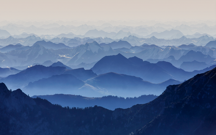 Blue mountains layered in atmospheric haze