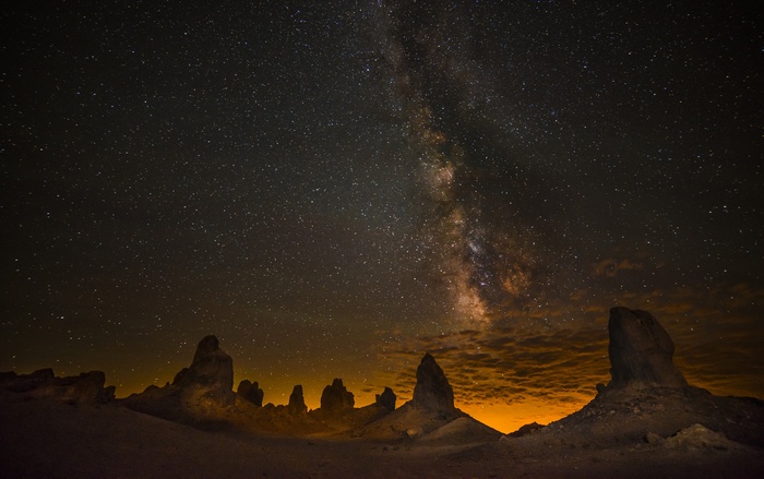 Milky Way over rock formations at night