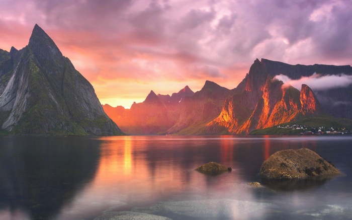 Mountains and lake at sunset in Lofoten, Norway