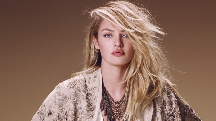 Candice Swanepoel with blonde hair and blue eyes