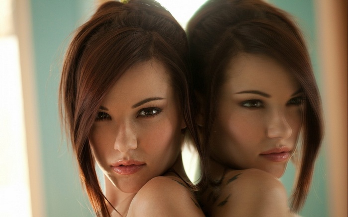 Elizabeth Marx's reflection in a mirror